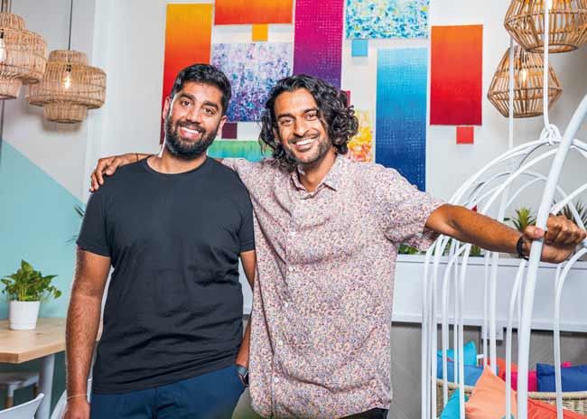  Rahul Vinod (left) and Sahil Rahman founded the Washington, D.C.-area fast-casual chain RASA after growing up in the restaurant industry—their fathers co-owned a full-service Indian restaurant in the city.