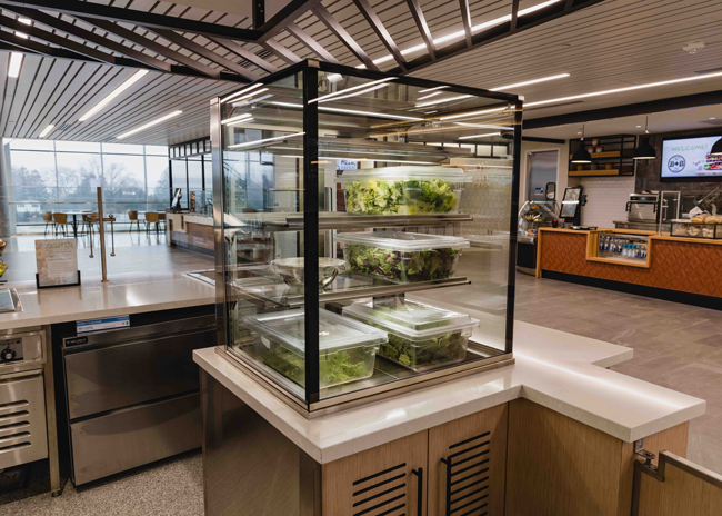 Fresh lettuce entices customers to frequent the salad bar.