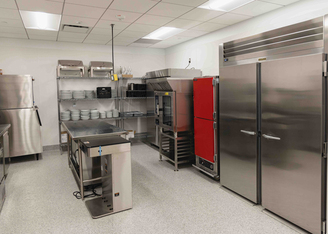 A walk-in cooler, a hot holding cabinet and other equipment allow efficiencies in the back of the house.