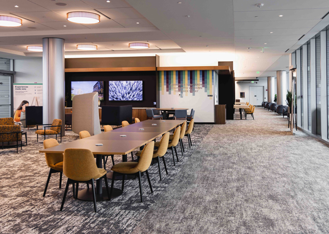 Open spaces  allow employees  to meet and dine  on the fifth floor.