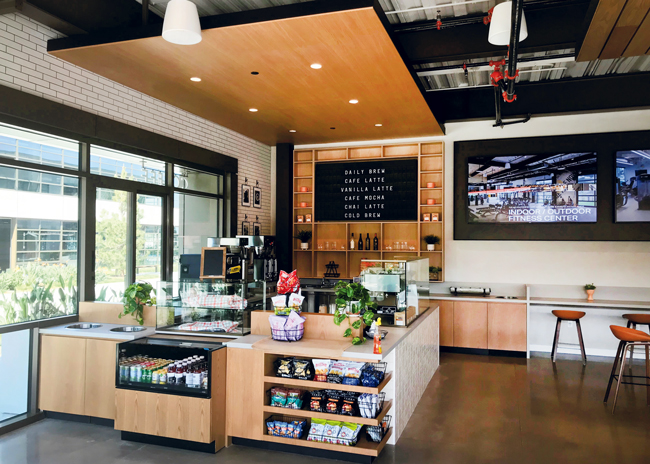 A mix of indoor and outdoor seating  is increasingly demanded by owners,  managers and tenants of office buildings. Shown here is the Olive Grove Cafe at Innovation Office Park in Irvine, Calif., designed by Avanti Restaurant Solutions to replace an earlier bakery cafe that was torn out in a recent renovation.  Photo courtesy of Avanti Restaurant Solutions