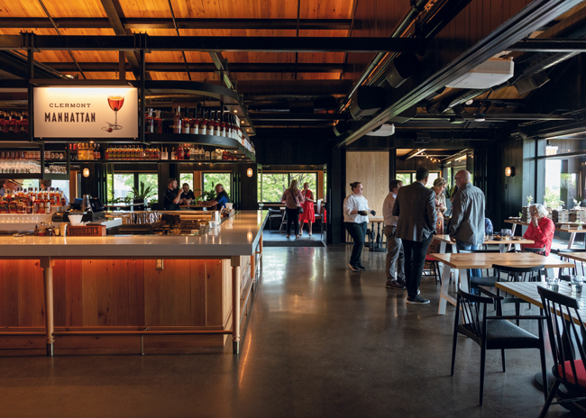 Guests gather in The Kitchen Table bar and enjoy the views of the Bernheim Forest and beyond. 