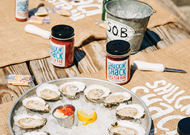 Customers encounter Shuckin’ Shack Oyster Bar’s sustainability commitment in the form of packaging and efforts to limit what ends up in landfills.