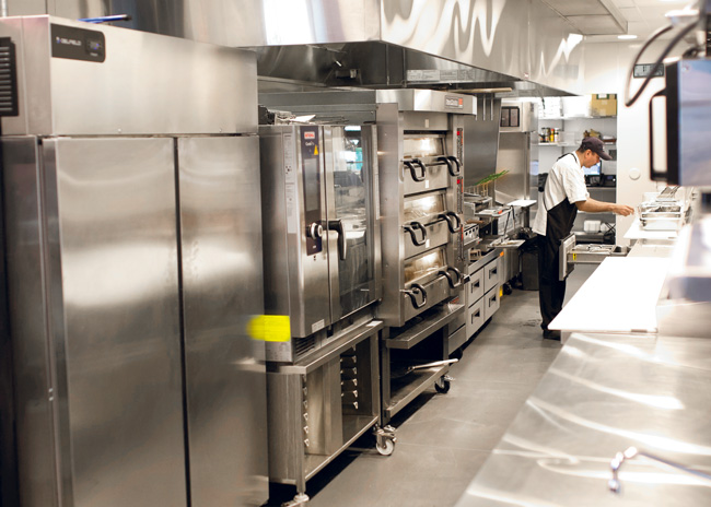 Combi ovens, a French-top range, a griddle, a salamander, a charbroiler and fryers comprise the hot food line.