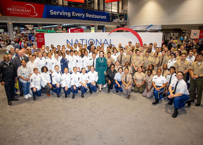 National Restaurant Association President and CEO Michelle Korsmo joined service members at the National Restaurant Association Show in Chicago on Armed Forces Day.