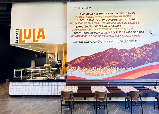 For Latin American-inspired cuisine, customers frequent La Mesa de Lula. The culinary team use a tortilla grill, a vertical broiler, a fryer and a range/griddle. A graphic explains the mission of The Lodge Dining Hall.