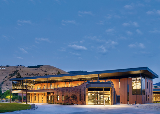 The stand-alone Lodge Dining Hall’s design frames views of campus landmarks and the surrounding hillsides where the landmark letter “M” on the west face of Mount Sentinel symbolizes and brands the Missoula valley. Photo courtesy of SMA Architecture