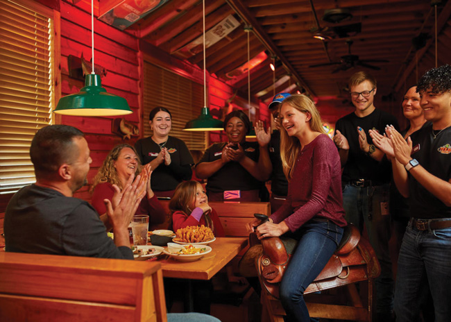 Known for having exceptionally friendly waitstaff, Texas Roadhouse also gets praised for building a sense of community through its restaurants.