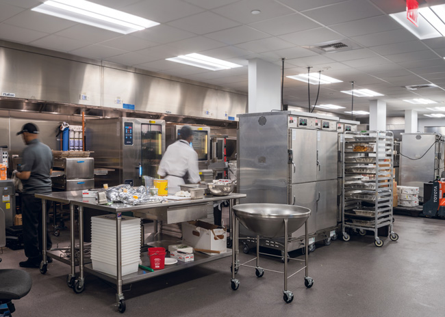 While central production kitchens like this one at Allianz Field, prepare and transport most food served in today’s sports venues, they are increasingly supported with strategically placed remote and finishing kitchens. 