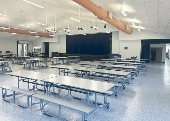 New tables offer diners choices in eating with small and large groups. A donor, the Wilburn family, is giving an art display in the seating area with images of students’ work and projects. The displays will be changed monthly.