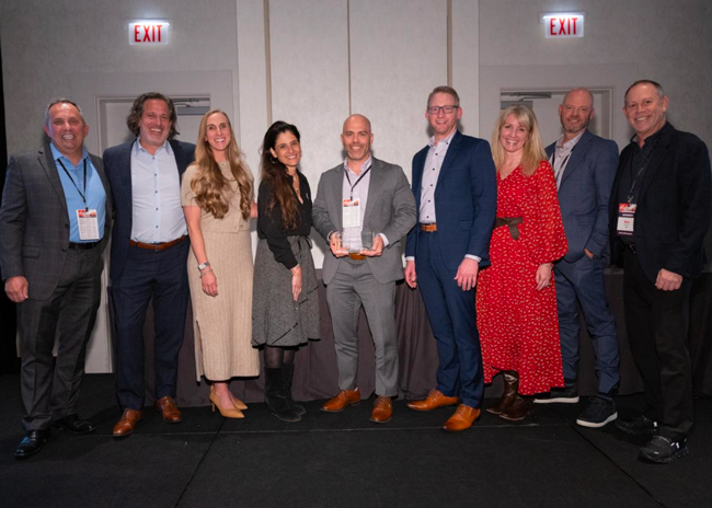 Left to right: Tom Venetis, Rich Packer, Jennifer Seisdedos, Nazzi Nargussi, Sean Hewes, Mark Humenansky, Lee Ann Kelly, Eric Hagge and Marc Tell