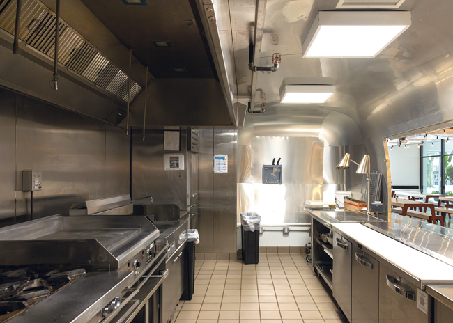 Food Truck contains a charbroiler, flattop griddle and fryer as well as a dual soft-serve and milkshake machine.