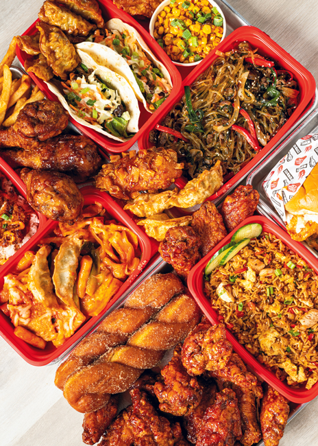 While Bonchon is most known for its Korean fried chicken, its expansive menu also includes traditional dishes like bibimbap and japchae, as well as fusion items such as bulgogi fries and Korean tacos. Photo courtesy Bonchon