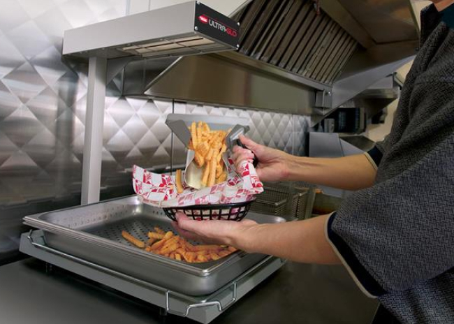 Fry dump stations keep cooked fries hot and crisp for fast, efficient plating.