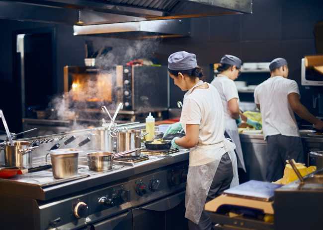 Cooking stations arranged in menu order reduce crossing paths, support consistent execution, and keep service moving smoothly.