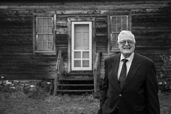 William Eaton in front of his Farmhouse