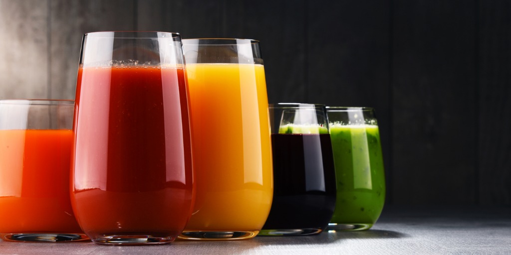 glasses with fresh organic vegetable and fruit juices picture id862626022